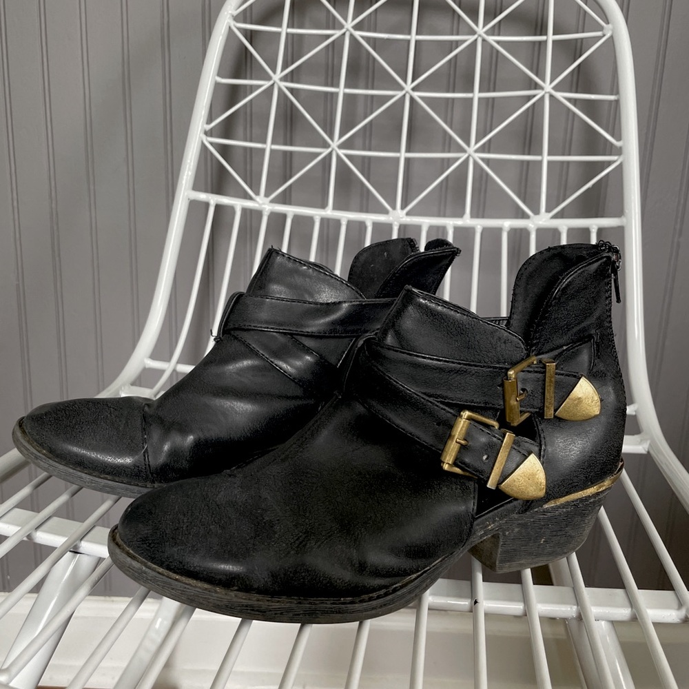 Black and gold buckled booties